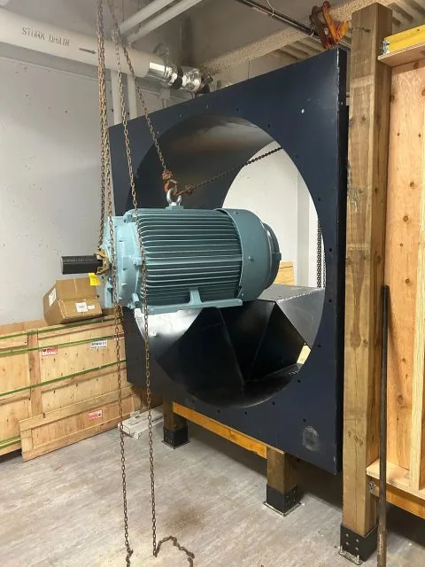 Motor and fan blades mounted to the bulkhead